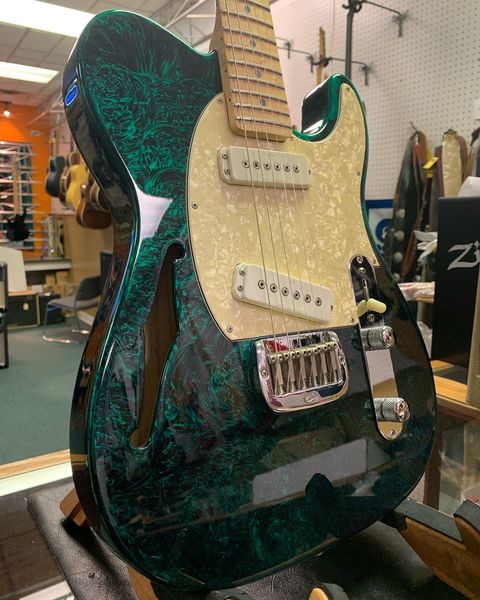 ASAT green swirl.jpg