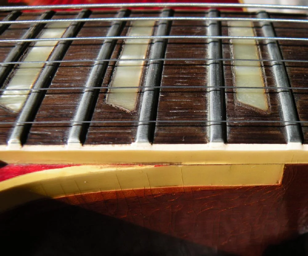 Burst Inlays & Binding Shrunkage.jpg