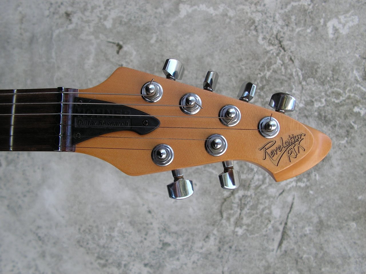 Hohner Revelation RTX 11 92 1283 Transparent Red head front.jpg