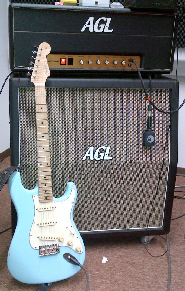 Sonic Blue Warmoth Strat and Bloody Roacka.jpg