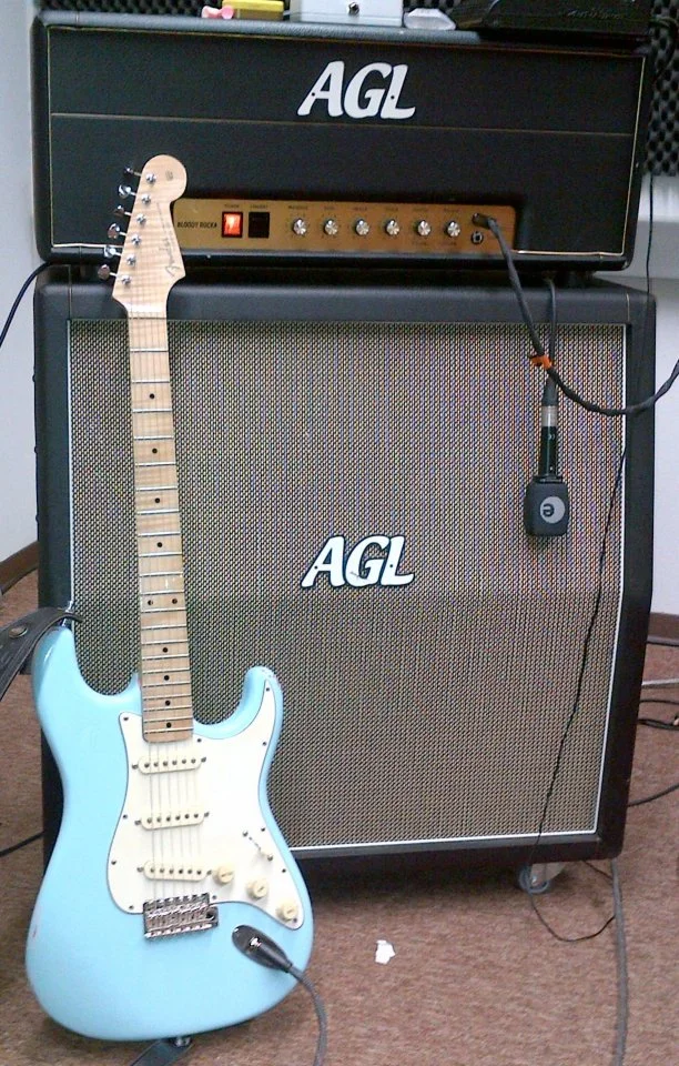 Sonic Blue Warmoth Strat and Bloody Roacka.jpg