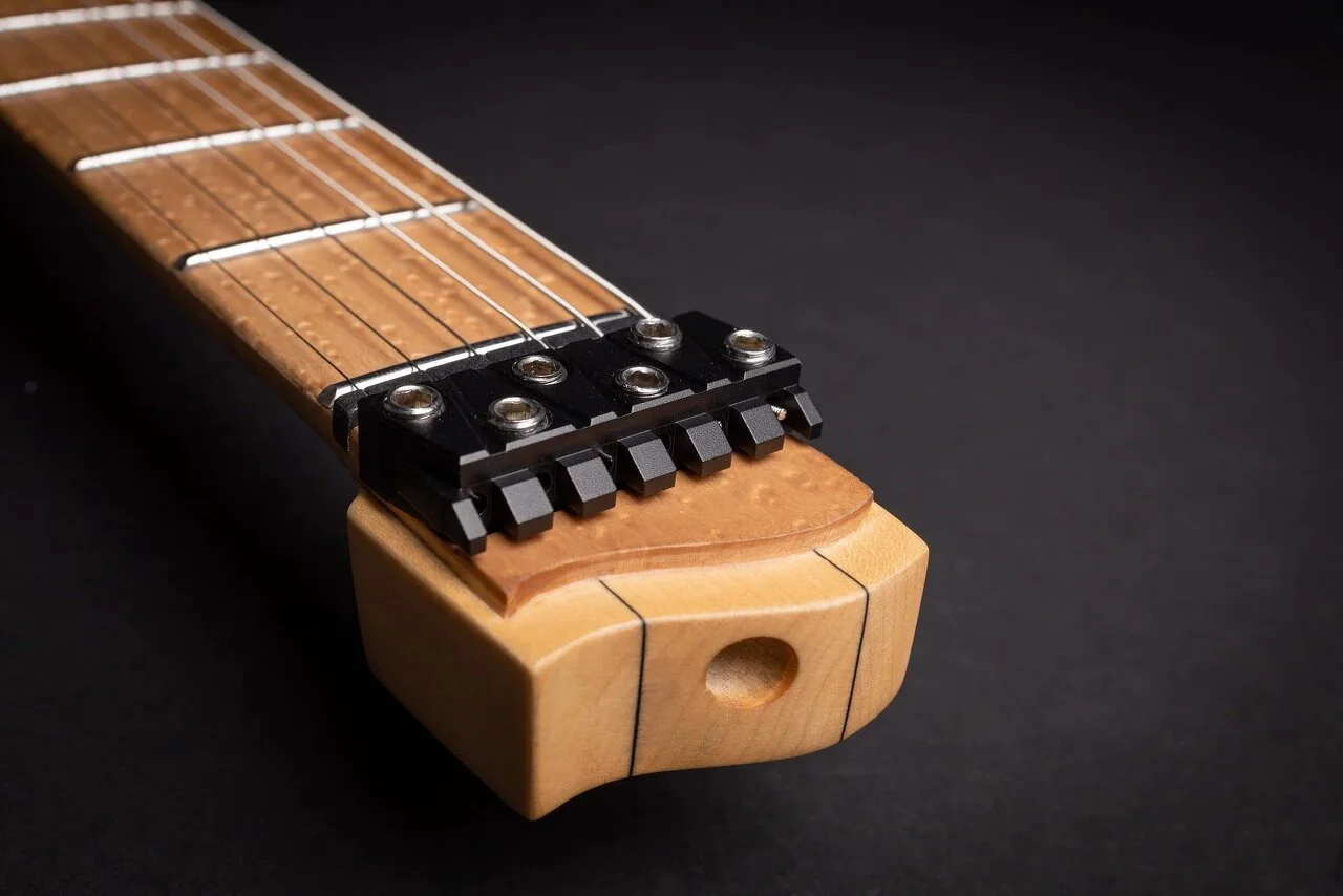 strandberg-nx-concept_1-rev-7-all-in-one-string-retainer.webp