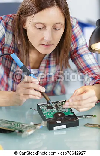 woman-soldering-a-circuit-board-in-her-stock-photo_csp78642927.png