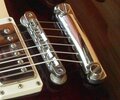 Les_paul_tune-o-matic_stopbar.jpg Les_paul_tune-o-matic_stopbar.jpg