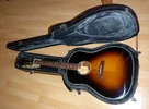 gitarre_im_koffer.webp