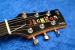 Jackson_JJ-2_Tobacco_Sunburst_(Headstock_2).webp
