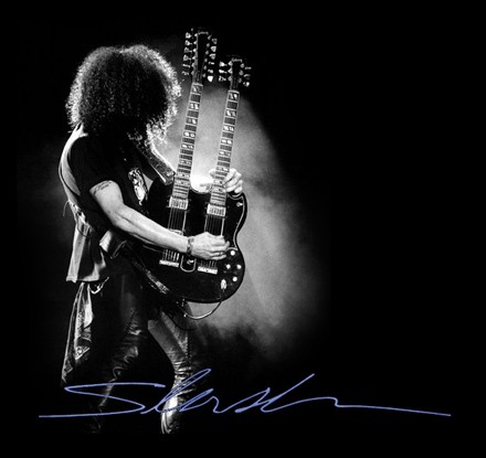 Slash live with a doubleneck guitar