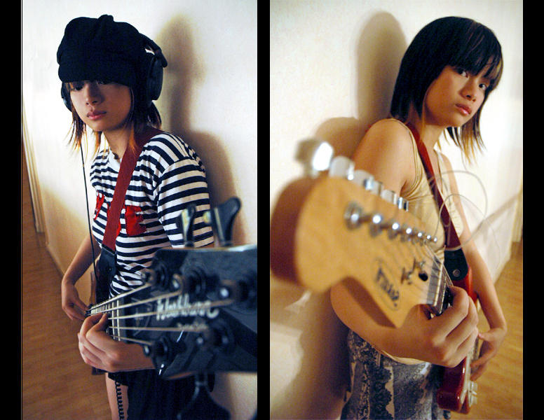 Bass_Girl_VS__Guitar_Girl_by_endintears.jpg
