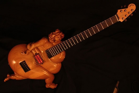 thumbs_big-butt-woman-guitar-ce638142e580a67b9347b53eeacc38a7d4a4009d.jpg