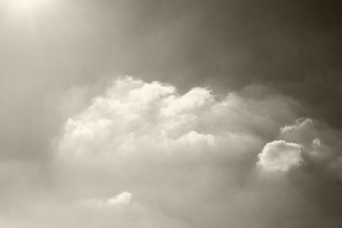 are_the_sun_destroying_clouds__by_roswell1947-d4tv2uu.jpg