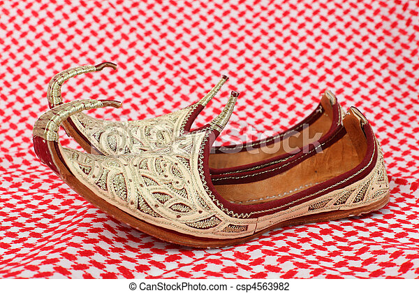traditional-oriental-shoes-over-arabic-stock-photo_csp4563982.jpg