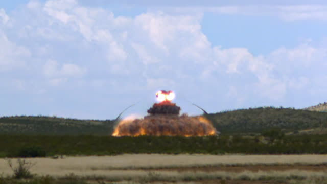 slow-motion-shots-of-a-large-explosion-with-a-visible-shock-wave-video-id511075590